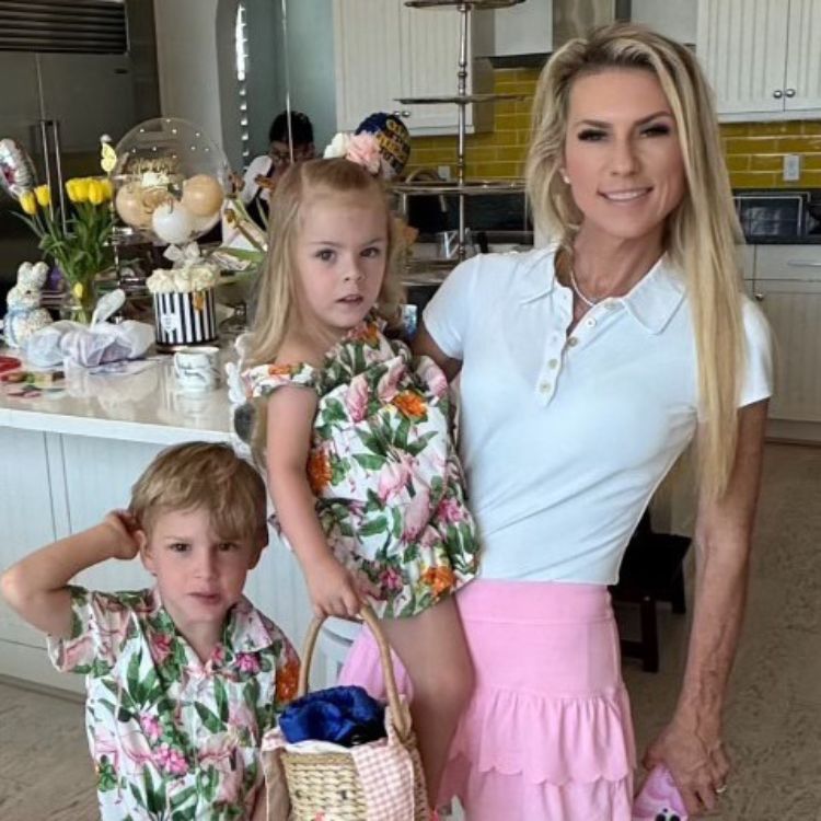 Sevy Petras with her kids in a gourmet kitchen.