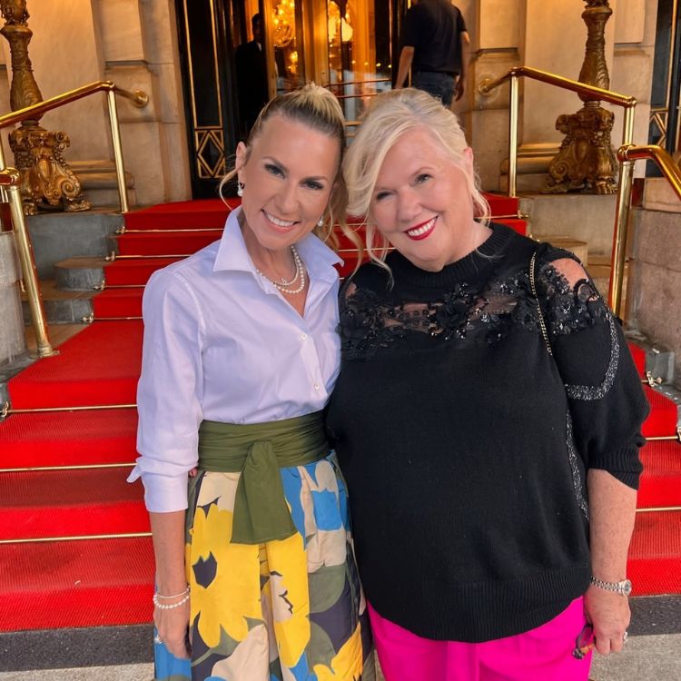 Sevy Petras with another woman on red carpet at a event.