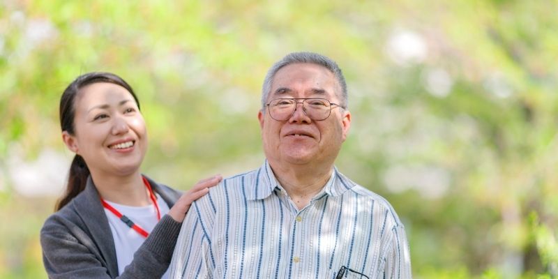 Signs-of-Dementia Senior man outdoors with a caregiver