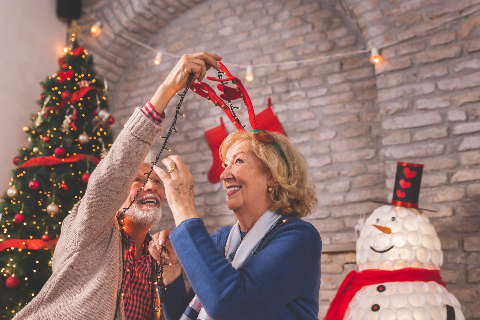 A senior couple celebrating Christmas